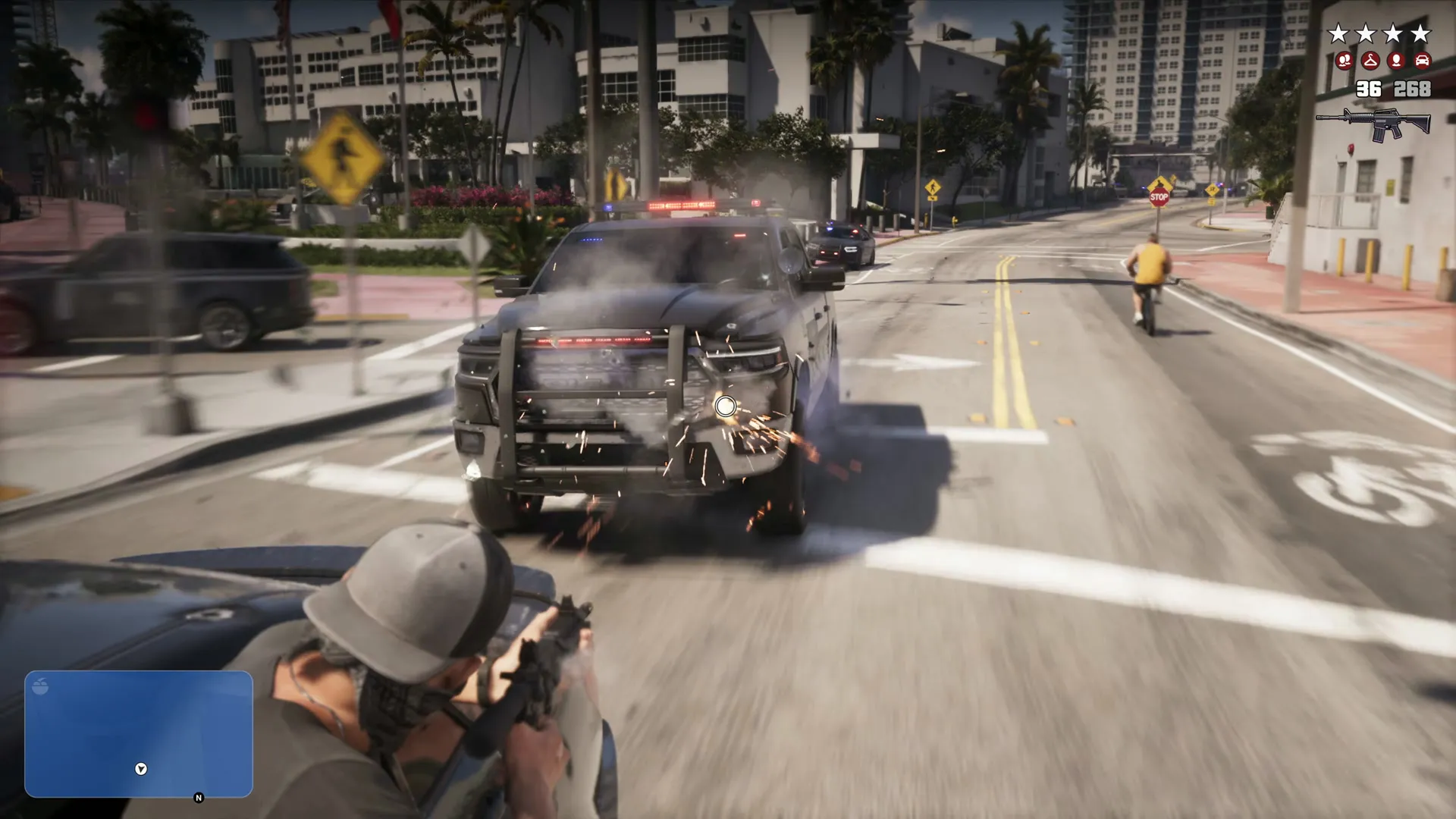 A man in a cap and bandana fires a rifle over a dark sedan at a police pickup on a Vice City street, four wanted stars lit