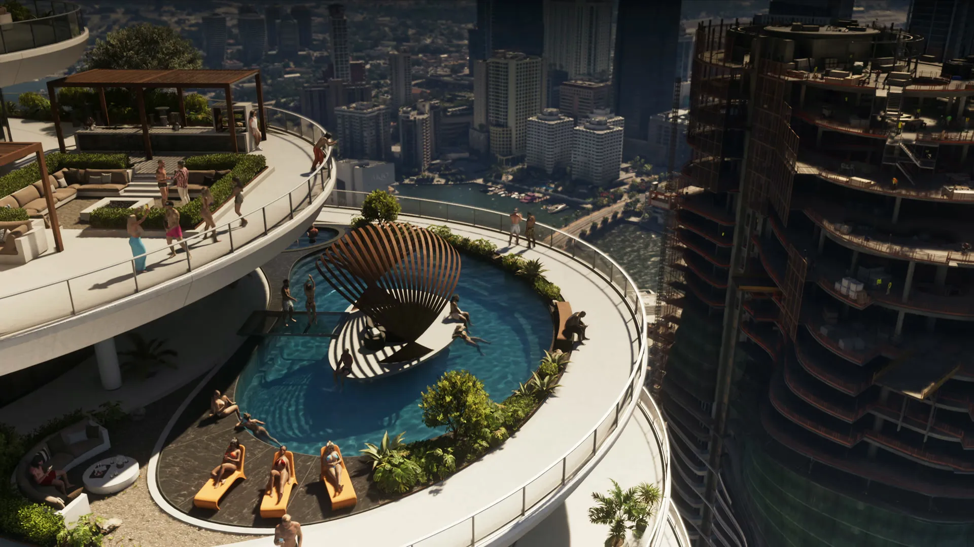 A resort pool deck on a curved tower above the city with sunbathers