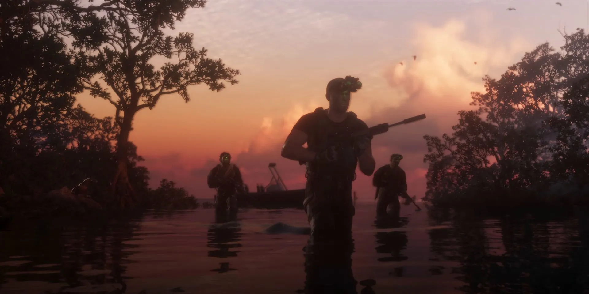 Armed men wade through mangrove water at sunset